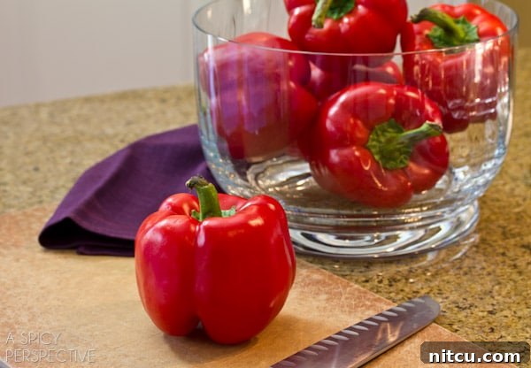 How to Oven Roast Red Peppers | ASpicyPerspective.com #howto #diy #redpeppers