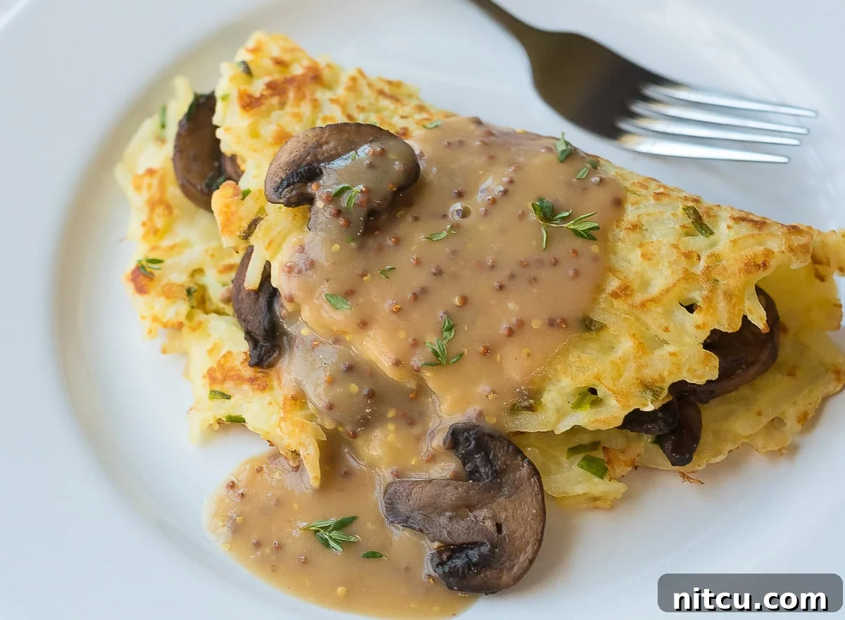 The Best Irish Potato Pancakes Recipe with Sautéed Mushrooms and Whiskey Gravy for Saint Patrick's Day Celebrations