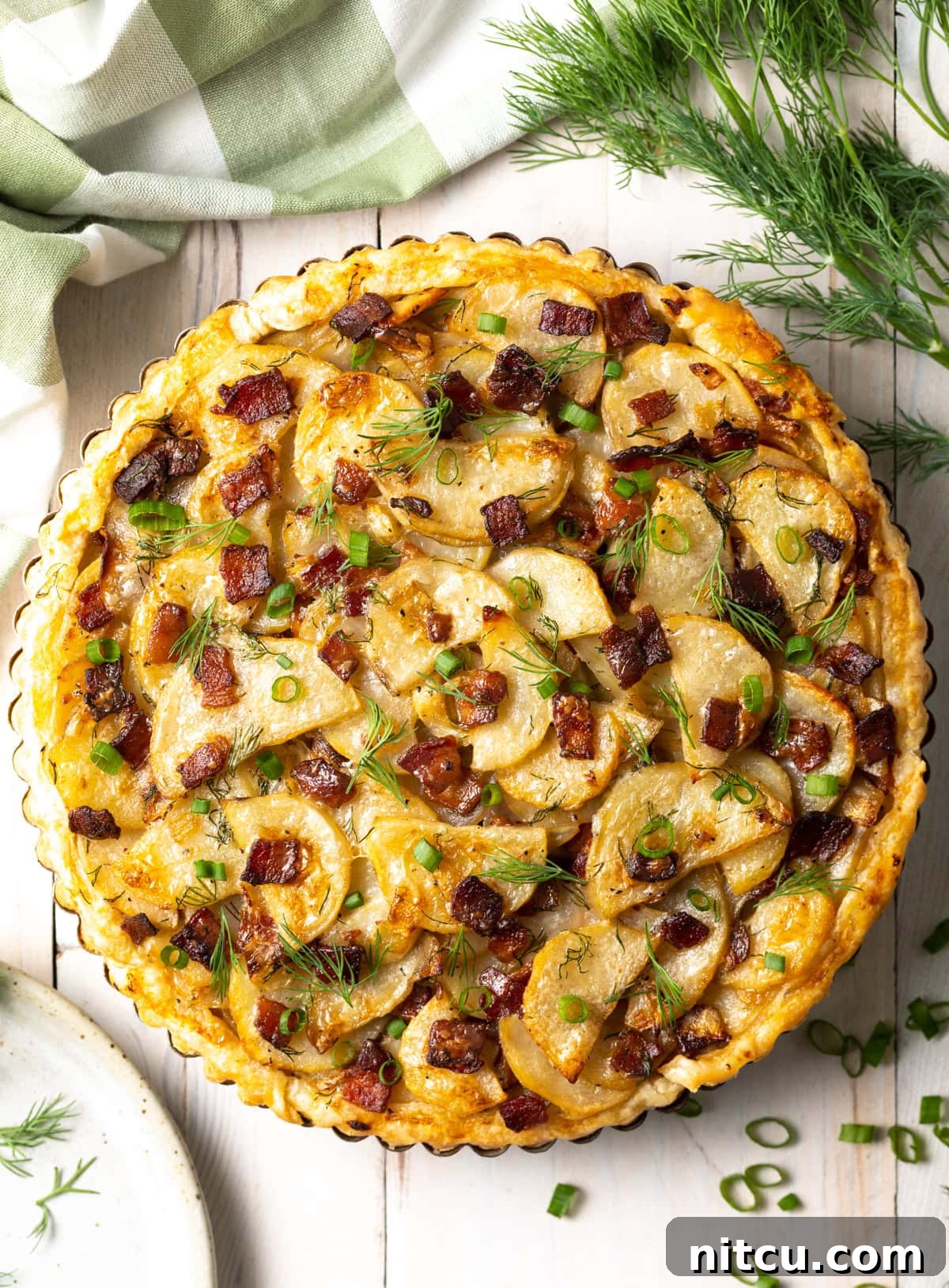 An overhead shot of the Irish potato pie fresh out of the oven, its crust golden and filling perfectly baked.