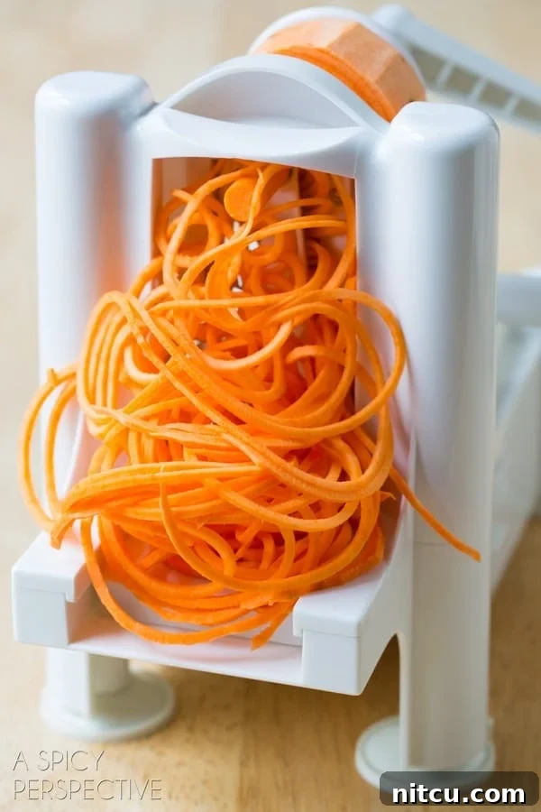 Spiralizing beets and sweet potatoes for a healthy raw salad