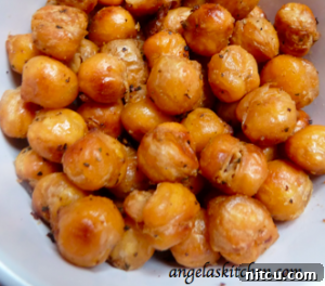 Crispy, golden brown gluten-free and dairy-free crunchy chickpeas, perfectly seasoned for a savory snack.