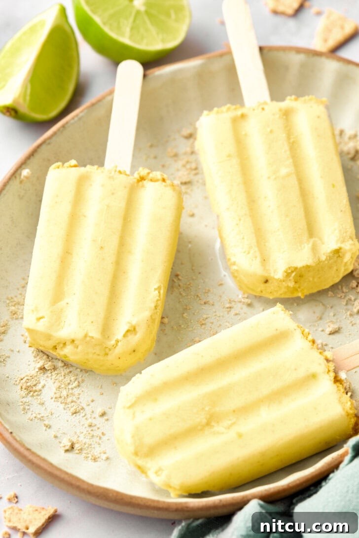 5-Ingredient Key Lime Pudding Pops - pudding popsicles close up on plate