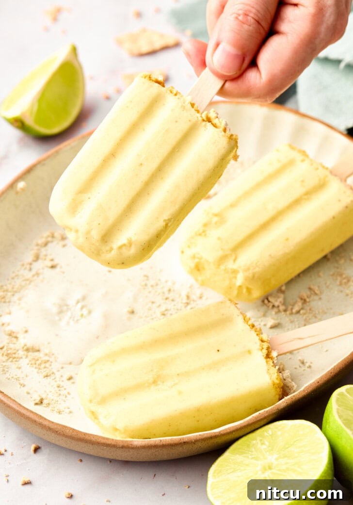 5-Ingredient Lime Pudding Popsicles - lifted off plate