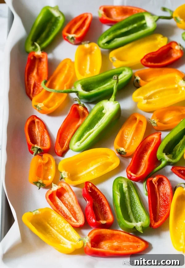 How to Make 3-Ingredient Mini Stuffed Peppers Recipe on ASpicyPerspective.com - So good! 