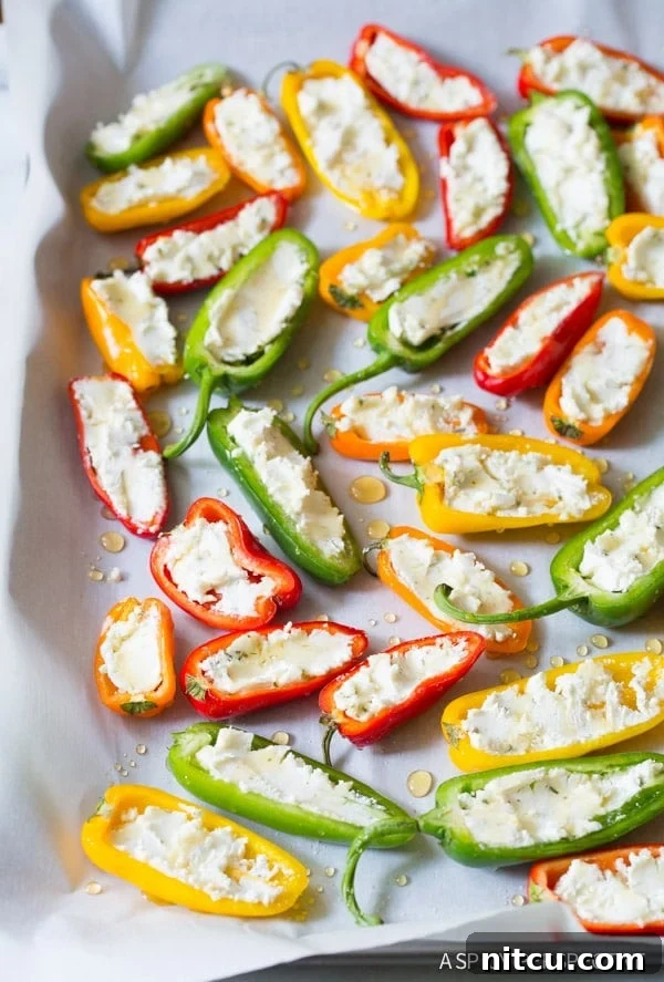 Easy to Make 3-Ingredient Mini Stuffed Peppers Recipe on ASpicyPerspective.com - So good! 