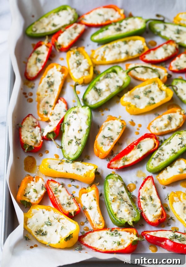Awesome 3-Ingredient Mini Stuffed Peppers Recipe on ASpicyPerspective.com - So good! 