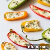 3-Ingredient Mini Stuffed Peppers Recipe on ASpicyPerspective.com - So good!