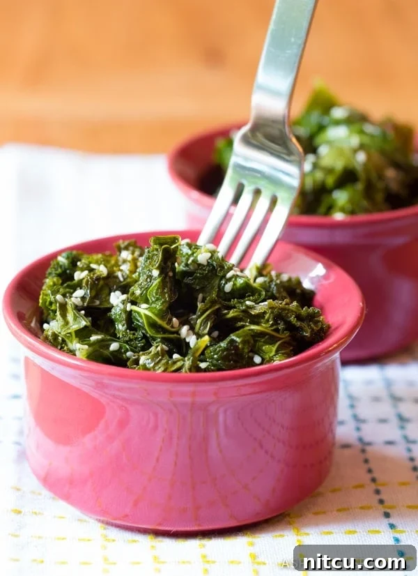 Swoon-Worthy Wilted Honey Butter Kale Recipe garnished with sesame seeds