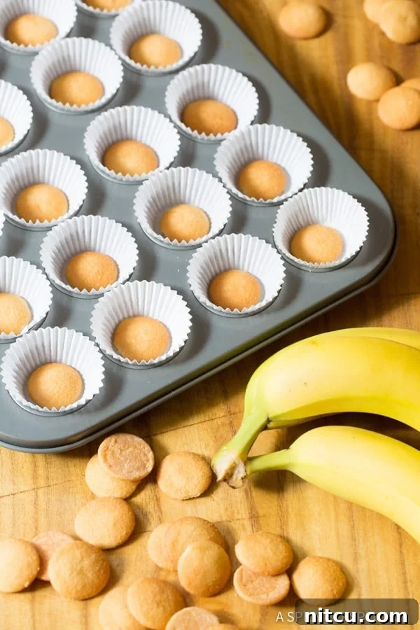 Making the Easy Mini Banana Cream Pie Recipe (Banana Pudding Tarts) on ASpicyPerspective.com 