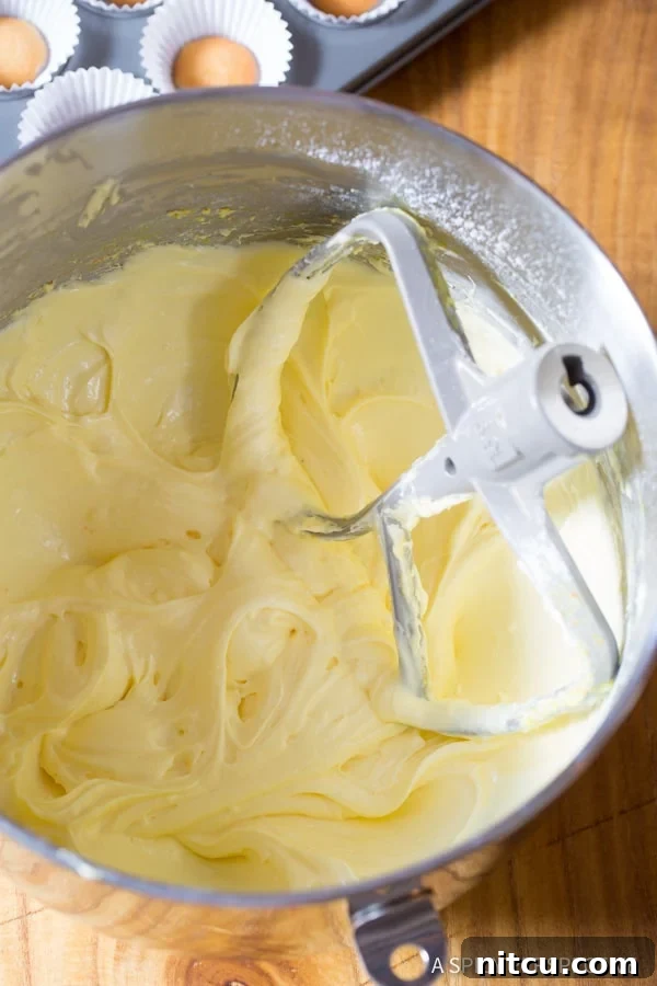 How to Prepare Mini Banana Cream Pie Recipe (Banana Pudding Tarts) on ASpicyPerspective.com 