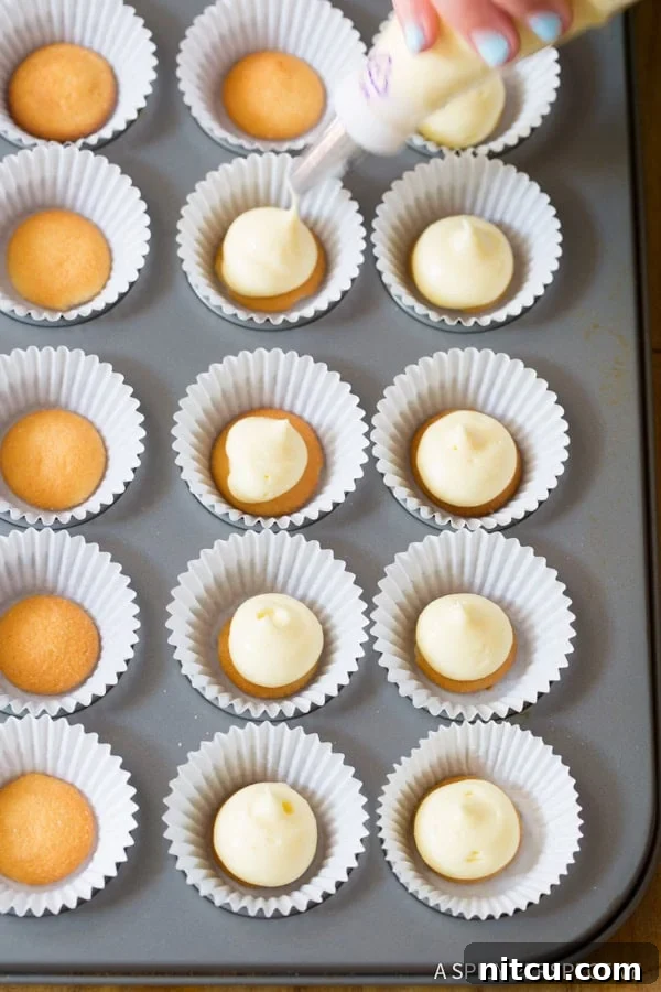 Delicious Mini Banana Cream Pie Recipe (Banana Pudding Tarts) on ASpicyPerspective.com 