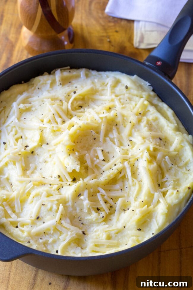 small saucepan with these cheesy mashed potatoes