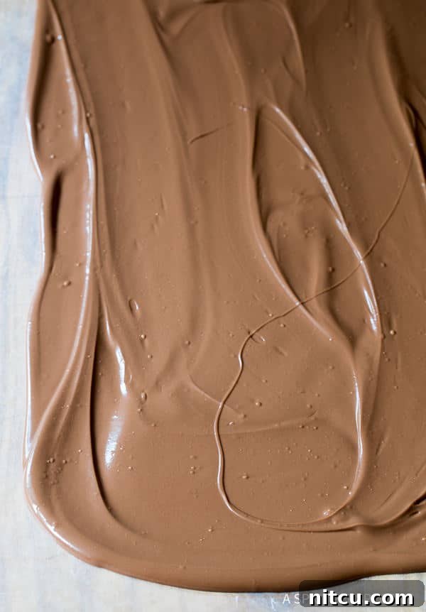 Ingredients for Mint Oreo Chocolate Bark: milk chocolate, Andes Mints, and Mint Oreos.