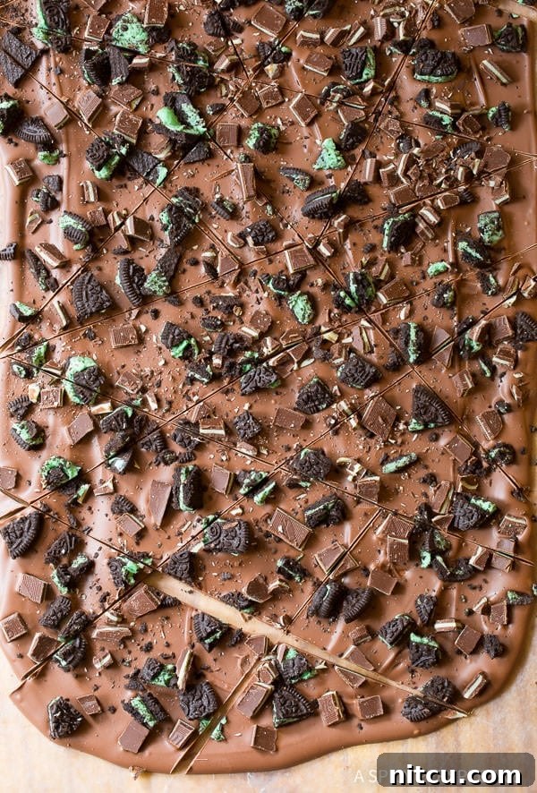 A close-up of delicious peppermint bark with Oreo pieces, a festive and quick dessert.