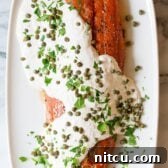 Crazy over this 10-Ingredient Smoky Baked Salmon Recipe with Creamy Horseradish Sauce on ASpicyPerspective.com #holiday