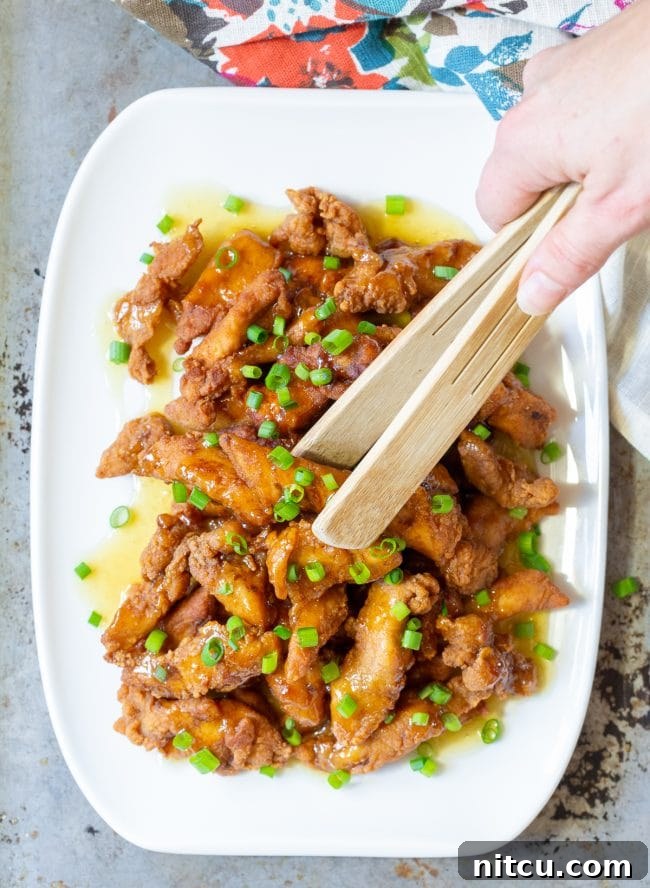 A serving of homemade paleo lemon chicken.