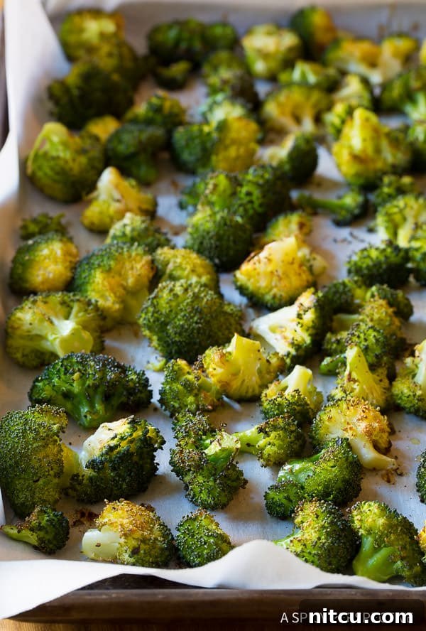 Perfectly coated broccoli florets ready for roasting