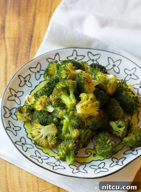 Delicious and healthy oven roasted broccoli side dish on a plate