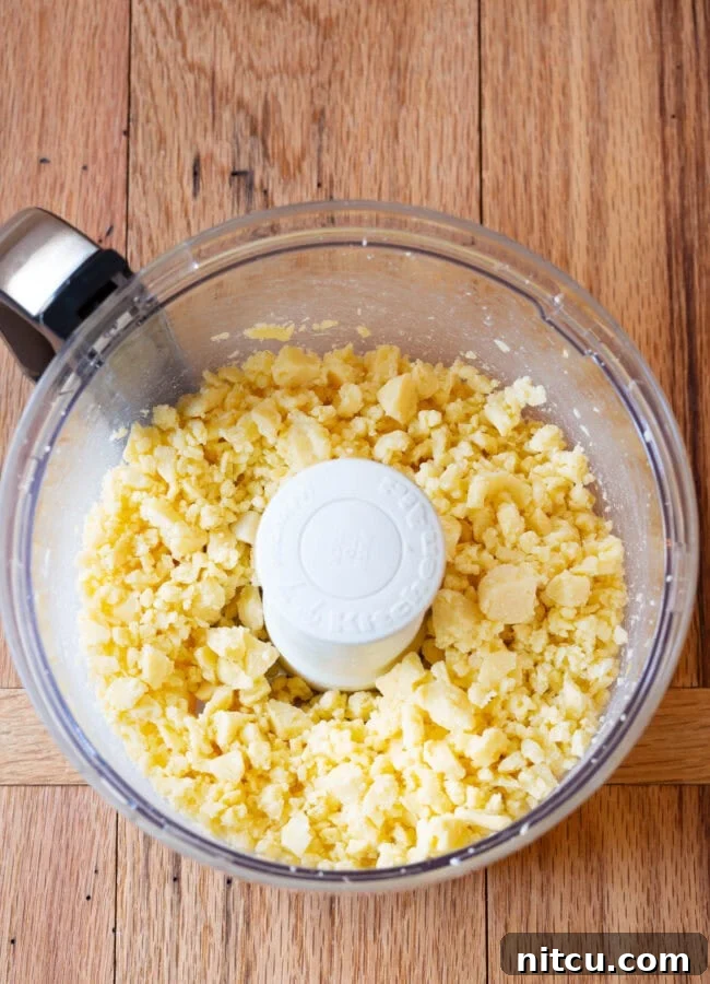 food processor creaming the cheese