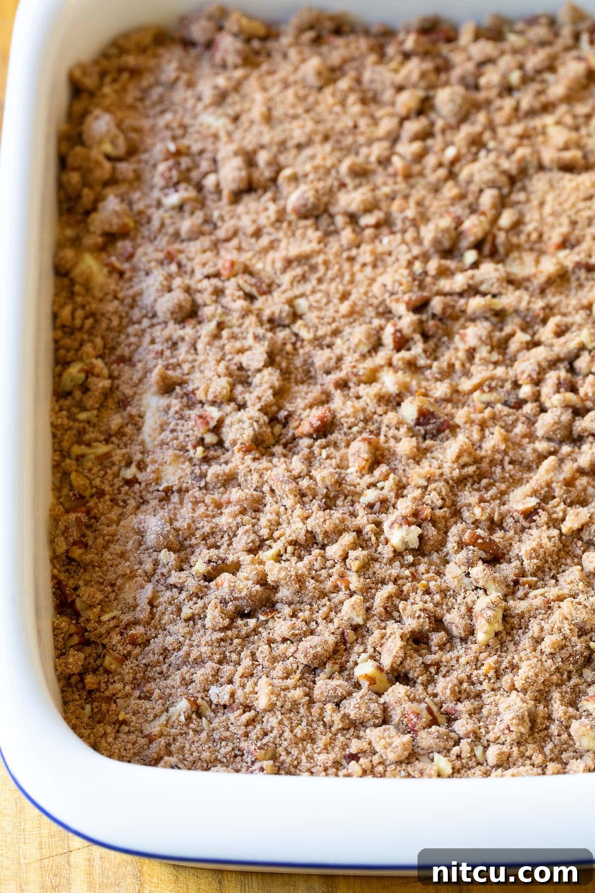 Cinnamon Coffee Cake Recipe with crumble top ready to go in the oven, promising a delicious outcome