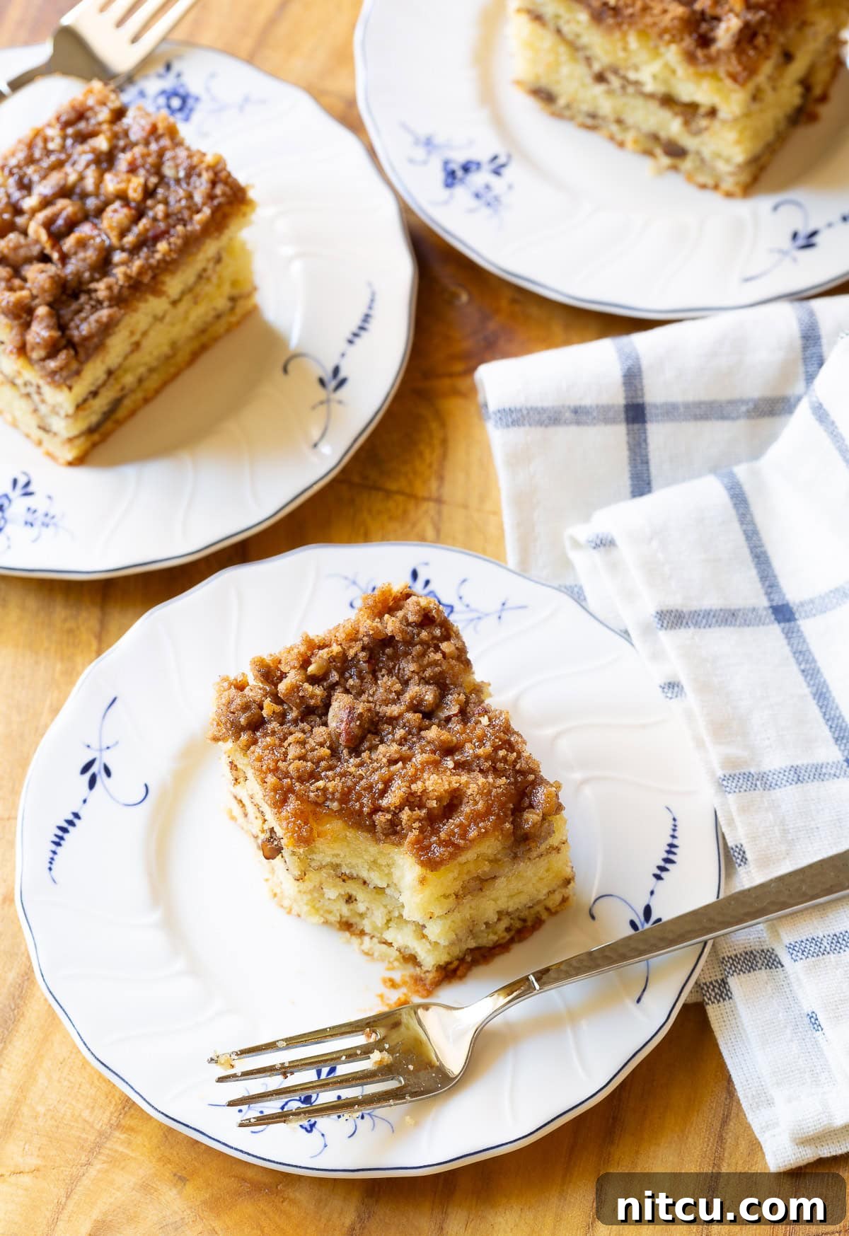 Kahlua Coffee Cake on plate with bite taken out, showing the rich texture.