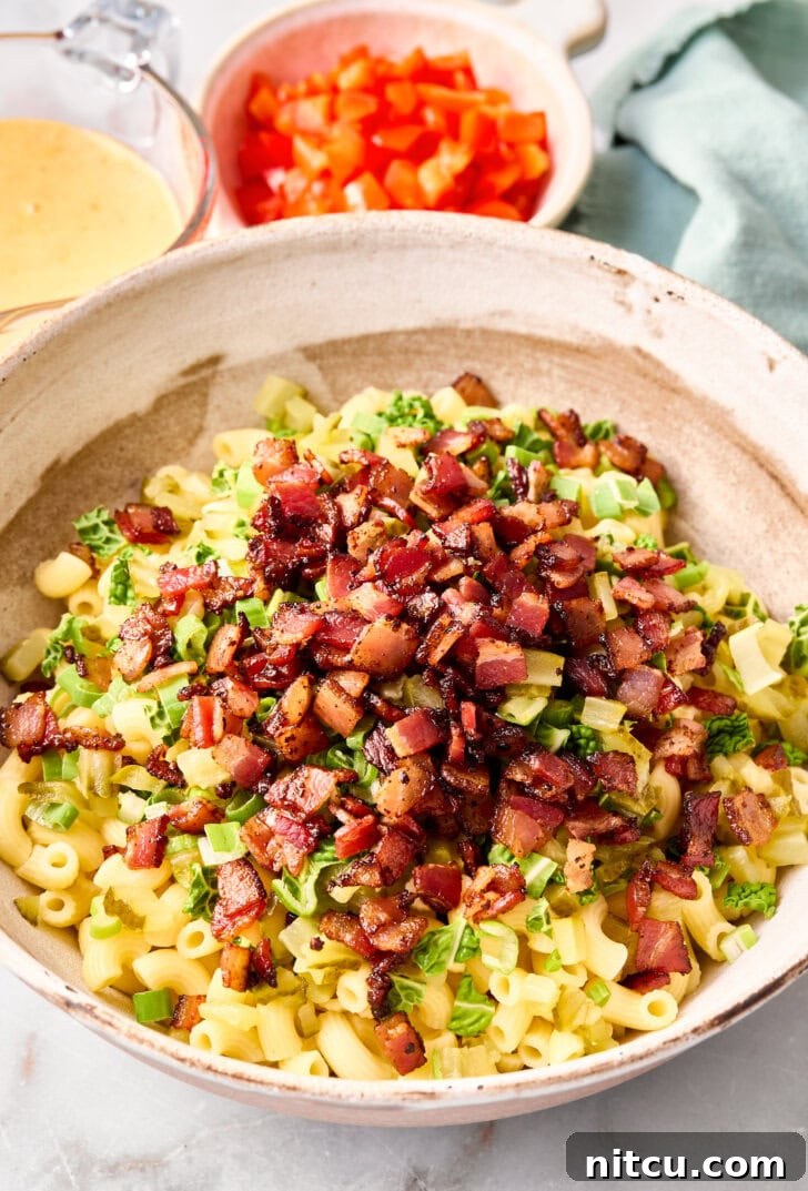 macaroni salad ingredients in bowl