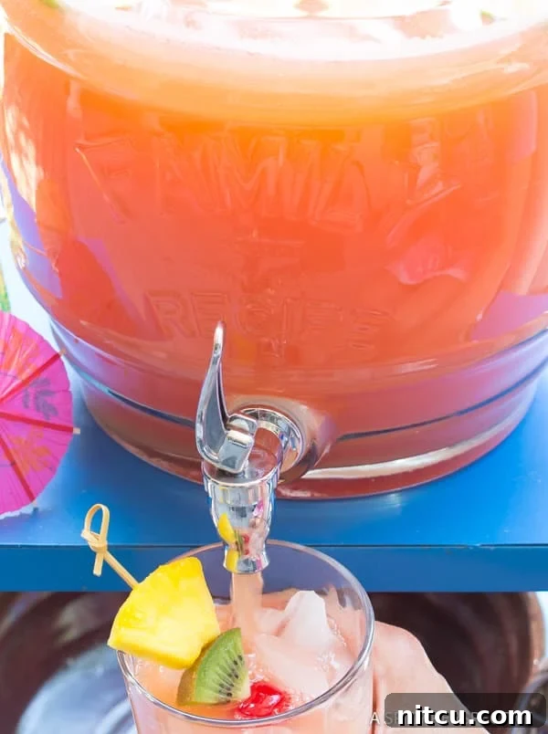 Summer Drink with Rum pouring into glass from a bottle