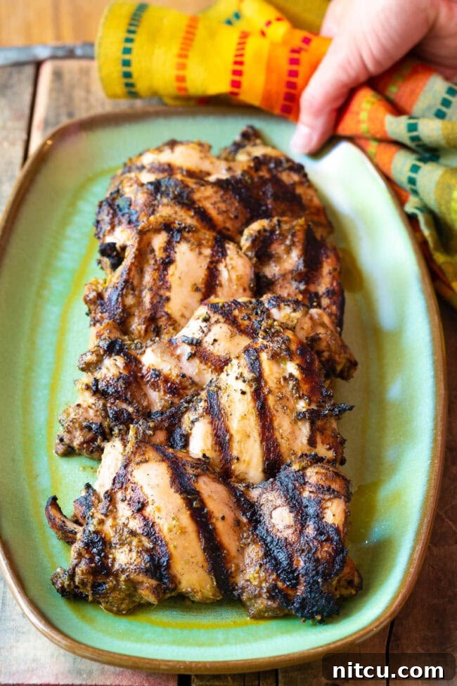 Grilled Jerk Chicken Thighs with visible marinade