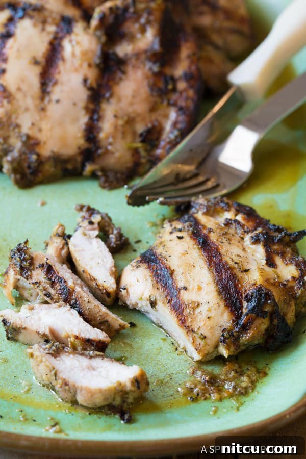 Easy Jerk Chicken Thighs - cut on plate to expose interior