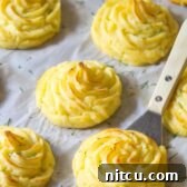 The Best Duchess Potatoes Recipe | ASpicyPerspective.com