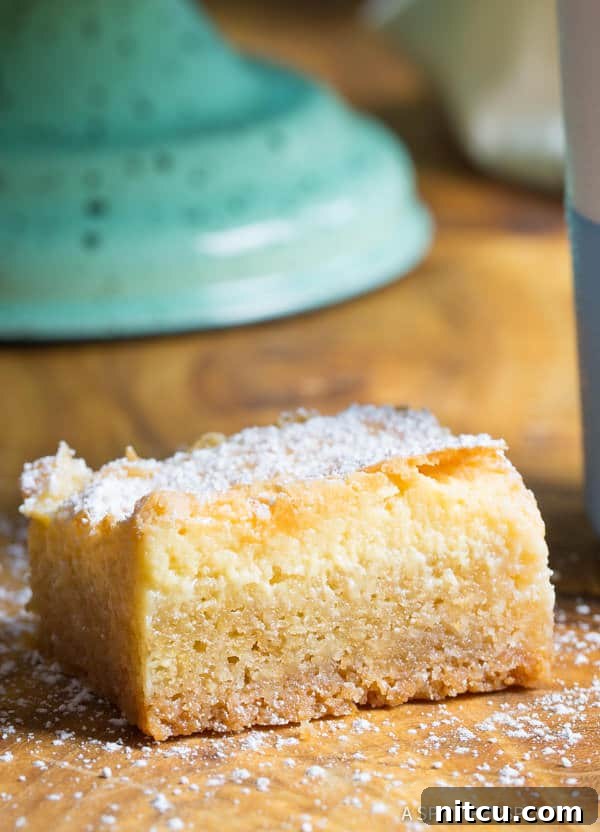 A slice of Gooey Butter Cake - close up.