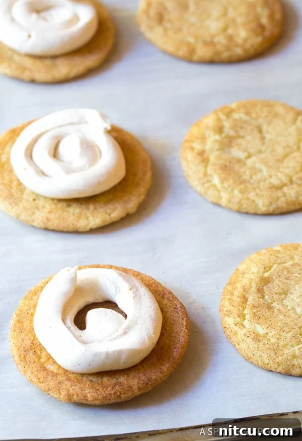 Snickerdoodle Sandwich Cookie Recipe  #ASpicyPerspective #snickerdoodle #cookies #holiday #christmas #whoopiepie