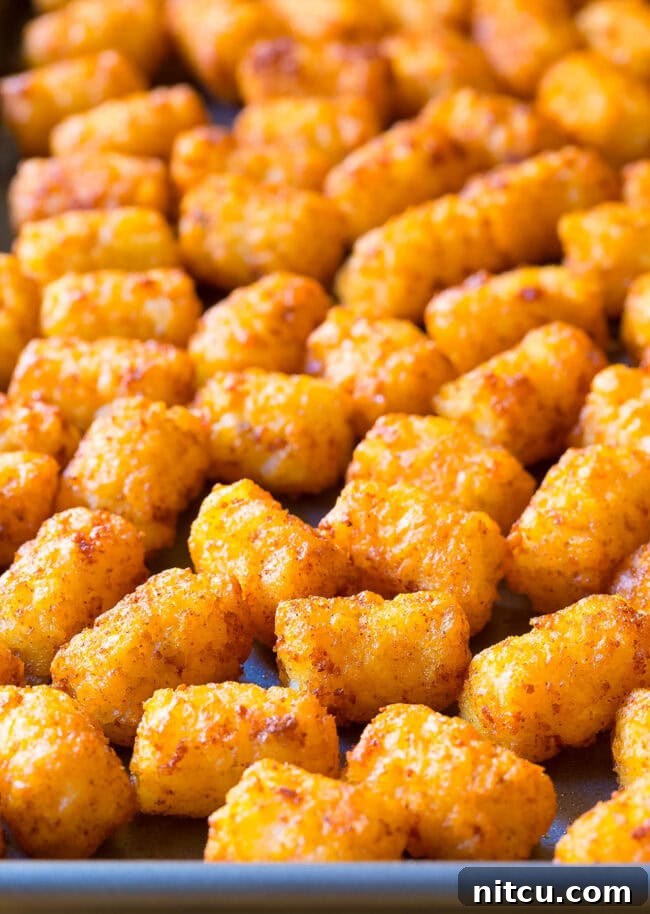 Tater tots on a baking dish. 