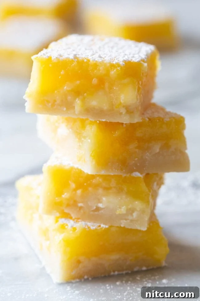 White Chocolate Lemon Bars Recipes - the best bars stacked on plate