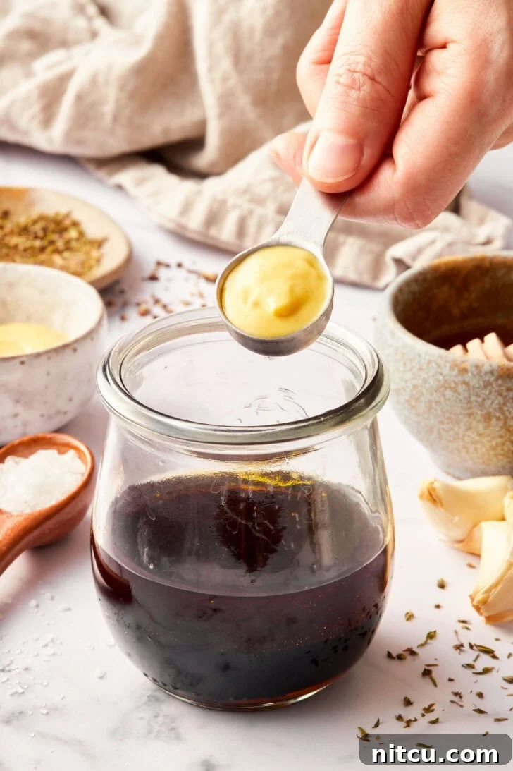 balsamic vinaigrette with a touch of dijon mustard to balance the flavor and thicken the salad dressing