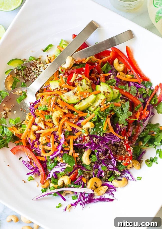 Best Quinoa Salad Recipe with Thai dressing, tossed in bowl, ready to serve
