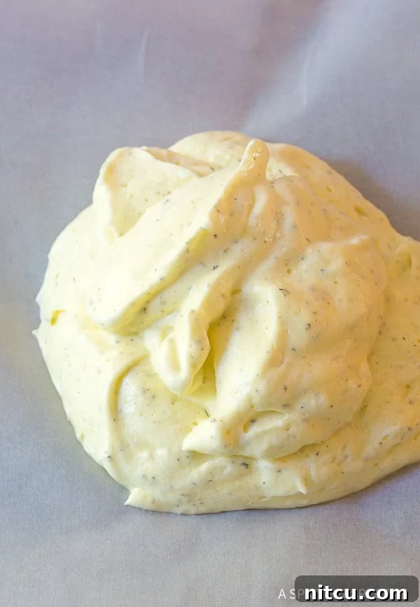 Cloud bread dough on a baking sheet.
