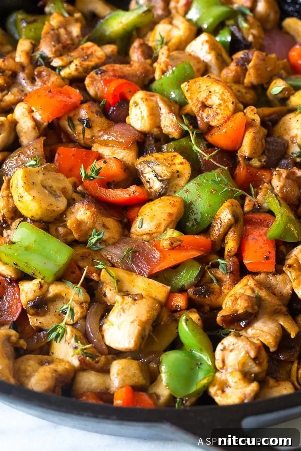 An enticing top-down view of the rustic Croatian chicken and vegetable skillet, ready to be served.