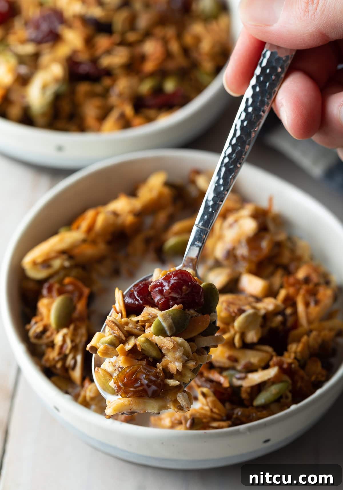 A bowl of Mother’s Famous Granola, perfect as cereal or tossed over yogurt for a healthy breakfast.