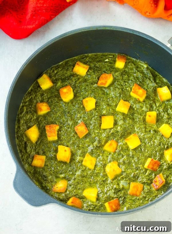 Finished saag paneer in a pot.