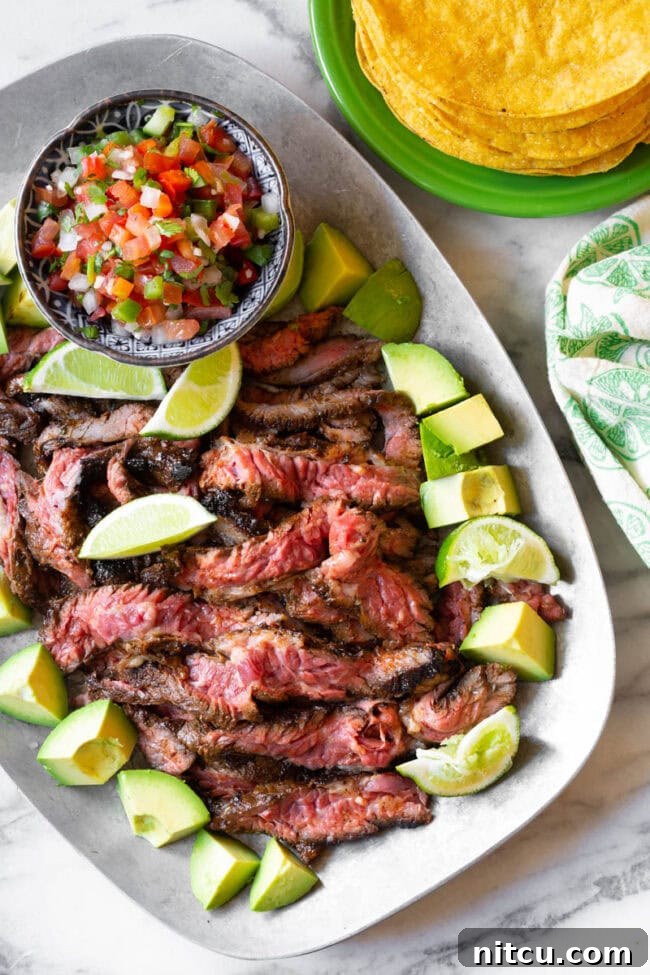 Freshly prepared Carne Asada marinade showcasing vibrant ingredients like cilantro, lime, and chili powder, ready to infuse the steak with flavor.