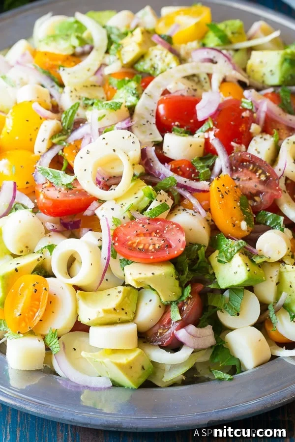 Brazilian Chopped Salad Recipe with hearts of palm, avocado, and Brazilian vinaigrette