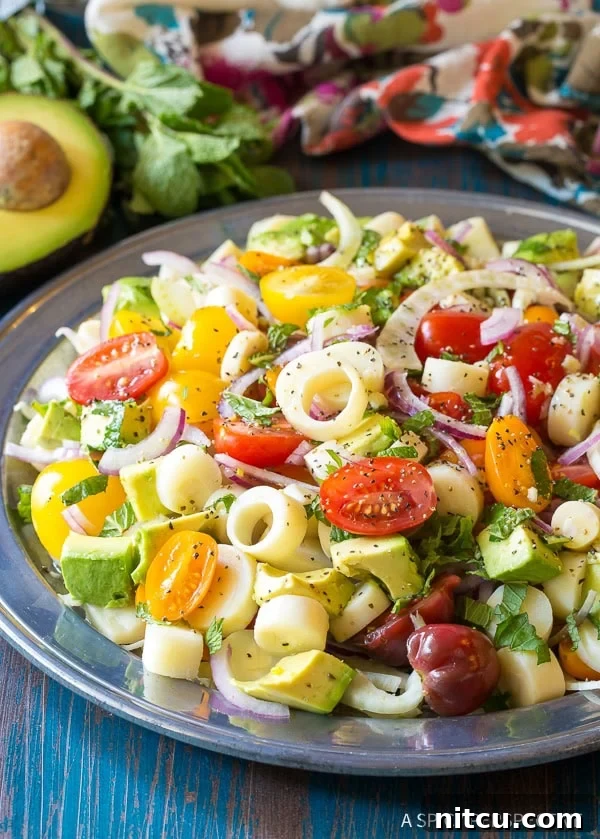 Crunchy Brazilian Hearts of Palm Salad with Brazilian Vinaigrette Recipe - close up of vegetables on platter