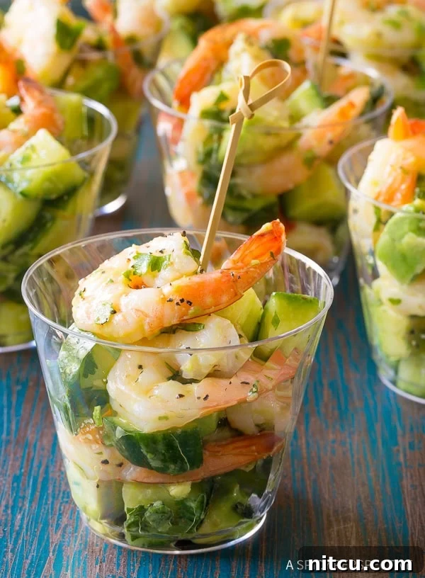 Healthy and refreshing Garlic Lime Roasted Shrimp Salad with fresh ingredients