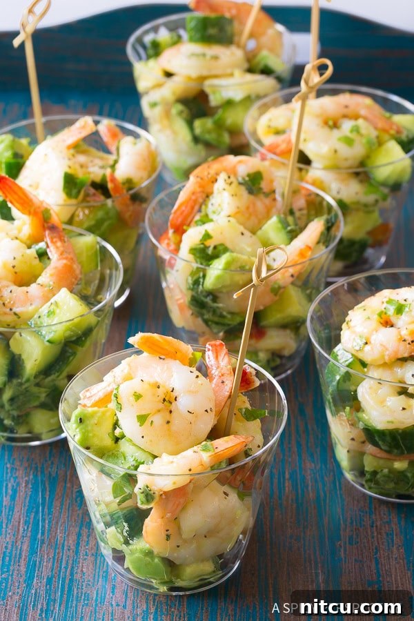 Beautifully presented Garlic Lime Roasted Shrimp Salad in serving cups