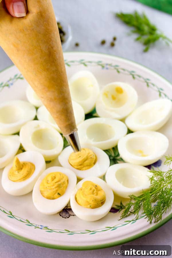 Piping filing into egg whites