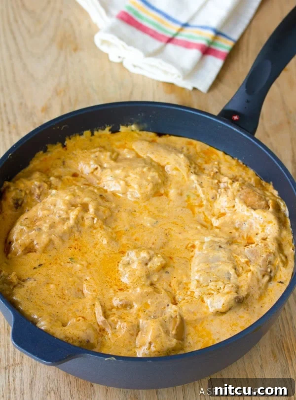 Rich and creamy Hungarian Paprikash sauce in a skillet, ready for chicken