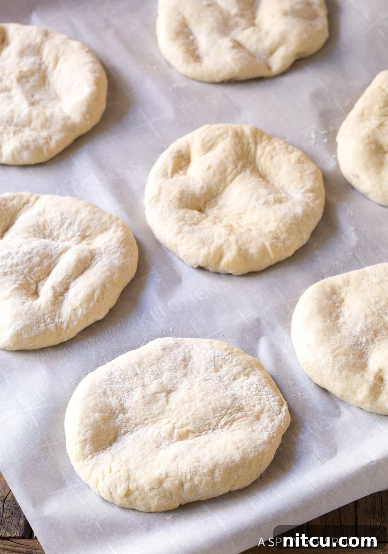 Lepinja Bread - disks of dough on baking sheet.
