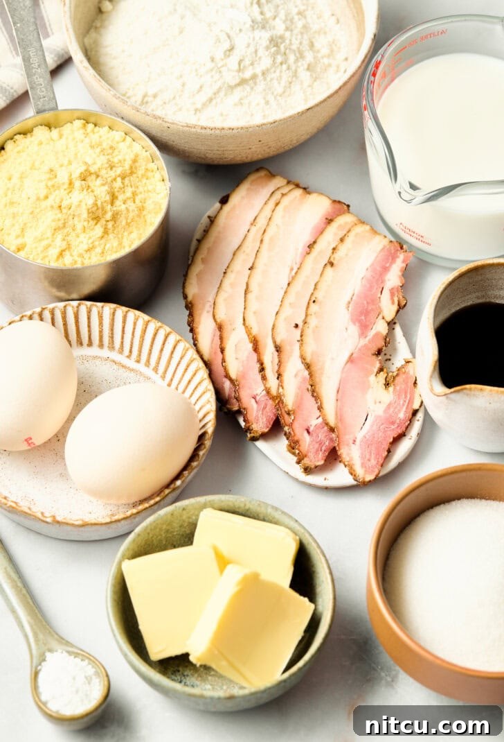 Ingredients for corn muffins laid out on a kitchen counter