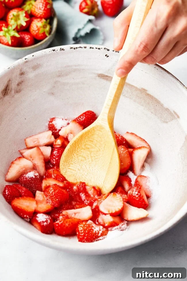 sliced strawberries tossed with sugar